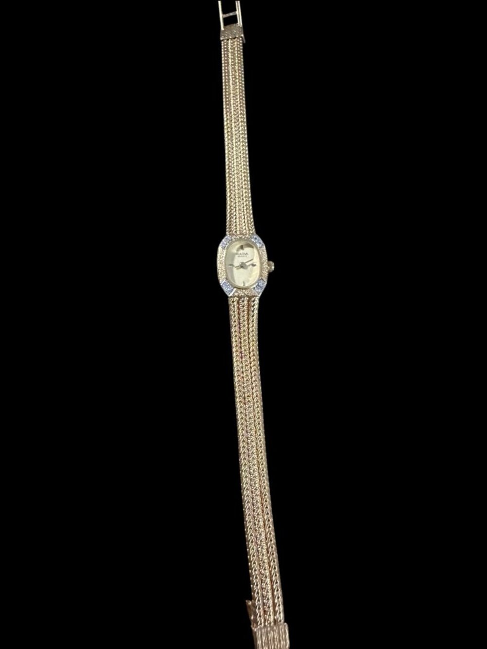 Bulova Quartz Women's Gold Tone Watch – Gemstone Bezel, Champagne Dial, Mesh Bra